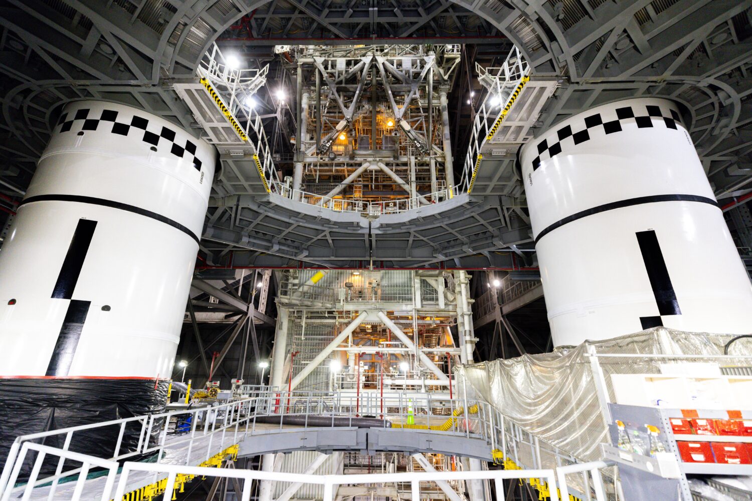 In this photo provided by NASA, the final left and right forward solid rocket booster motor segment...