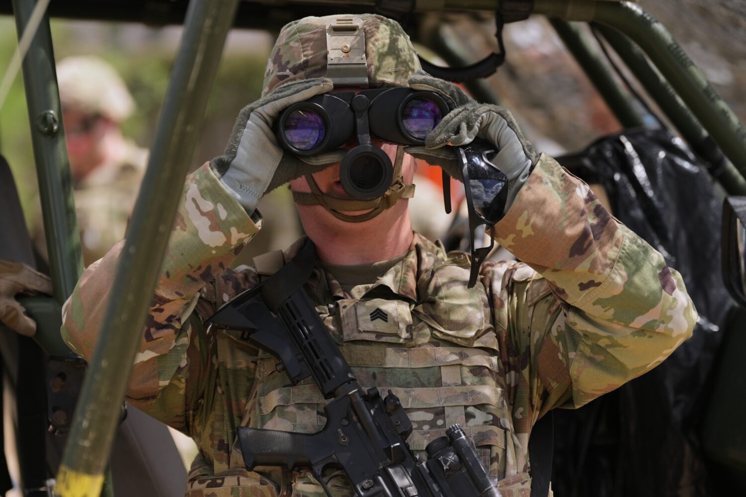 U.S. Army personnel keep watch over the U.S.-Mexico border in Roma, Texas, Thursday, Oct. 8, 2026. ...