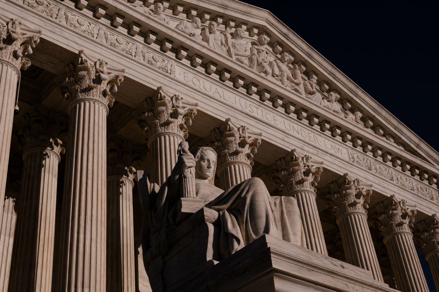 The statue Contemplation of Justice at the Supreme Court is seen at day's end in Washington, Thursd...