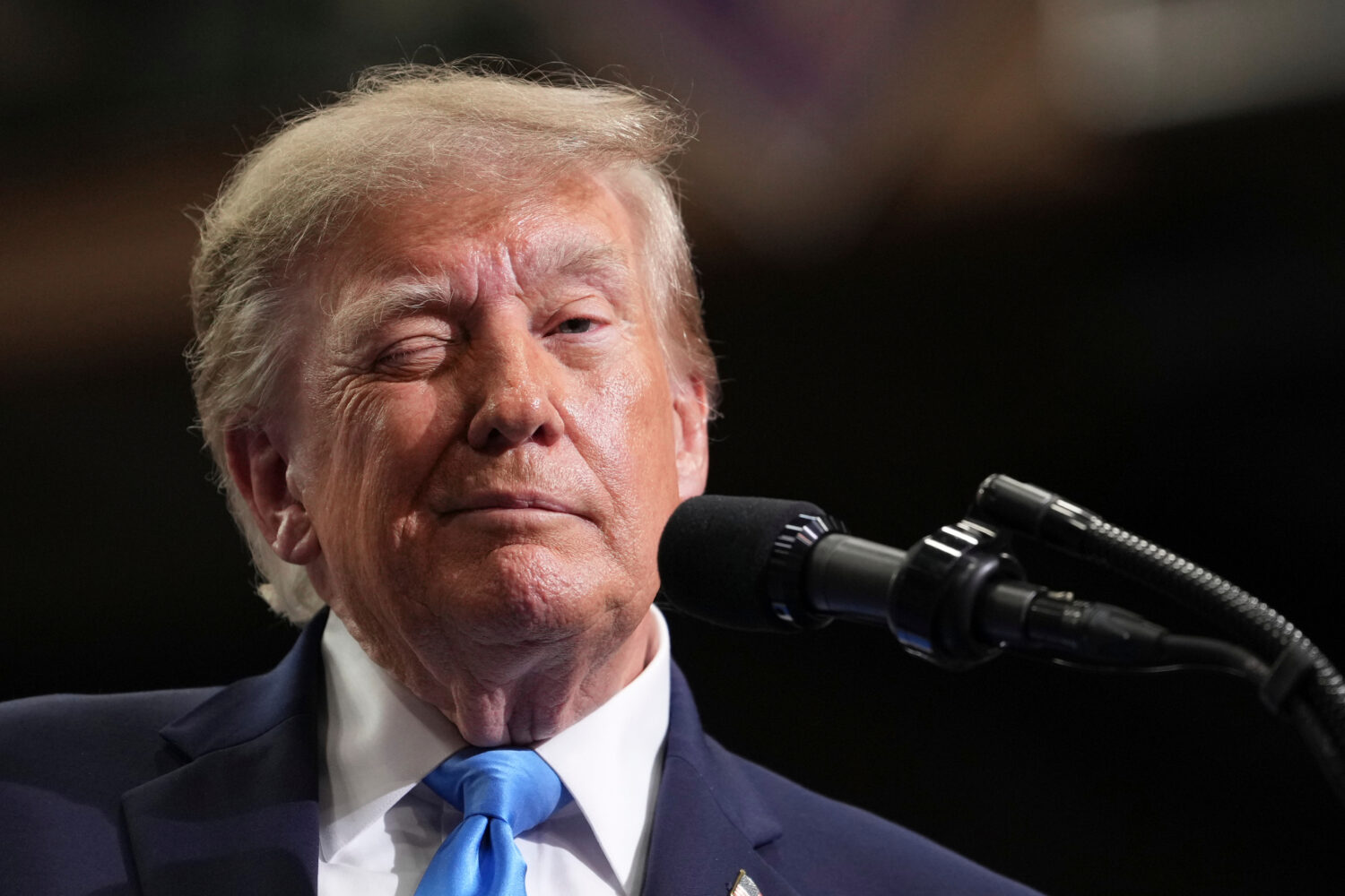 President Donald Trump winks as he speaks during an event at Butler High School in Vandalia, Ohio, ...