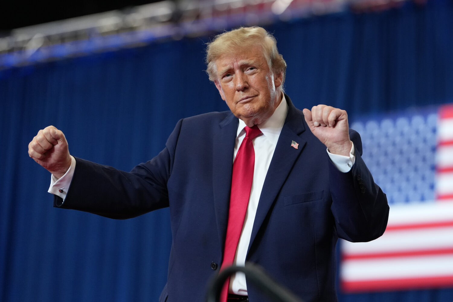 President Donald Trump dances at a campaign rally at the Lubbock Memorial Civic Center, Tuesday, Oc...