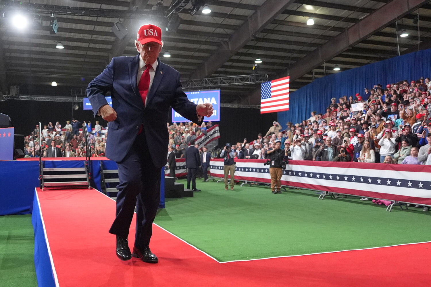 President Donald Trump dances at a campaign rally at Majestic Valley Arena, Wednesday, Oct. 14, 202...