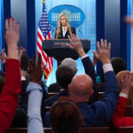 New White House press secretary’s debut: Brief, limited questions and some harsh reviews
