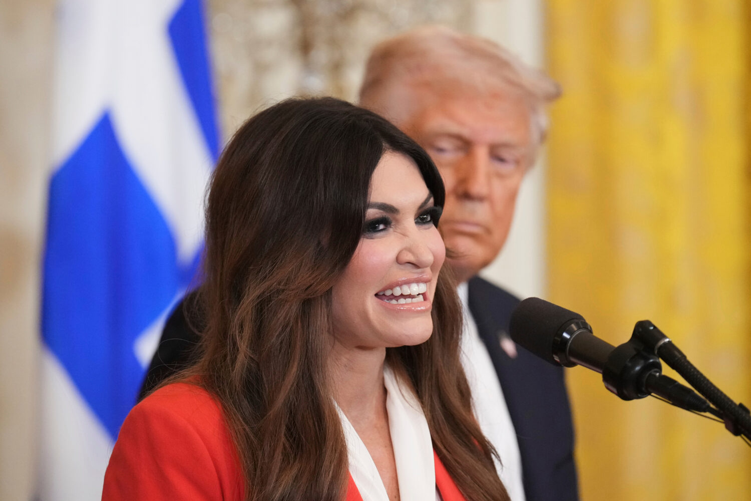 FILE - Kimberly Guilfoyle speaks as President Donald Trump listens at a reception celebrating Greek...