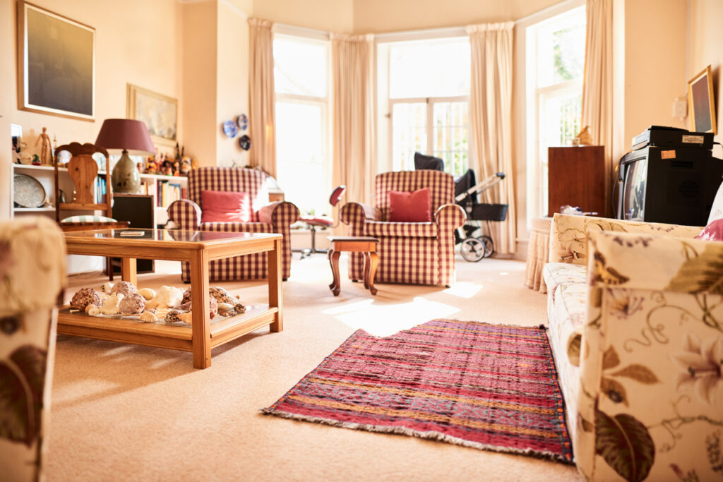 A room fit for aging in place is uncluttered and has plenty of room to navigate a walker or a wheelchair. Photo via iStock.