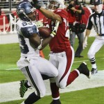 Seattle Seahawks' Deion Branch (83) makes a touchdown catch against Arizona Cardinals' Roderick Hood, right, in the second quarter of an NFL football game Sunday, Dec. 28, 2008 in Glendale, Ariz. (AP Photo/Ross D. Franklin)