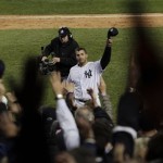 New York Yankees' Andy Pettitte tips his cap after being relieved by Joba Chamberlain during the sixth inning of Game 6 of the Major League Baseball World Series against the Philadelphia Phillies Wednesday, Nov. 4, 2009, in New York. (AP Photo/Julie Jacobson)