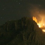 A brush fire burns at the scene of an 
aircraft that crashed in the Superstition 
Mountains in Apache Junction, Ariz., on 
Wednesday, Nov. 23, 2011. The small plane 
with three adults and three children on board 
crashed into the Superstition Mountains east 
of Phoenix on Wednesday, and there was no 
sign of survivors, authorities said. (AP 
Photo/Tim Hacker East Valley Tribune)