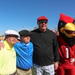 Arizona Cardinals Head Coach Bruce Arians (black shirt) played in the 2014 CBS Outdoor Special Olympics Open at TPC Scottsdale and also will play in Wednesday's Pro-Am. (KTAR Photo/Mark Remillard)
