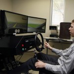 2012 NASCAR Sprint Cup Series Champion Brad Keselowski tests out a driving simulator at the Phoenix VA Health Care System on Monday. Keselowski surprised several veterans with race tickets to the NASCAR Sprint Cup Series 500 at Phoenix International Raceway on Sunday, March 2.