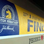 An honorary finish line painted on the wall of Runner's Den. (KTAR Photo/Martha Maurer)