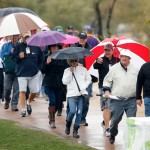 Fans fans walk to exits during the second round of the Phoenix Open golf tournament, Friday, Jan. 30, 2015, in Scottsdale, Ariz. (AP Photo/Rick Scuteri)

