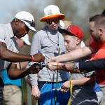 Arizona Cardinals' Patrick Peterson signs his autograph for Scotty and CJ Shaver at the pro-am for the Phoenix Open golf tournament at TPC Scottsdale on Wednesday, Jan. 28, 2015, in Scottsdale, Ariz. (AP Photo/The Arizona Republic, Rob Schumacher)