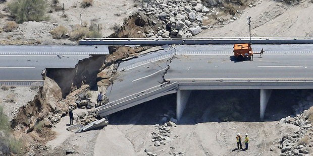 This aerial photo shows the collapsed elevated section of Interstate 10, Monday, July 20, 2015, in ...