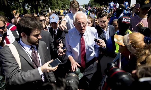 Democratic presidential candidate Sen. Bernie Sanders, I-Vt., speaks to reporters after speaking to...