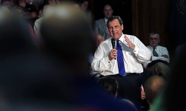 Republican presidential candidate New Jersey Gov. Chris Christie gestures during a town hall meetin...