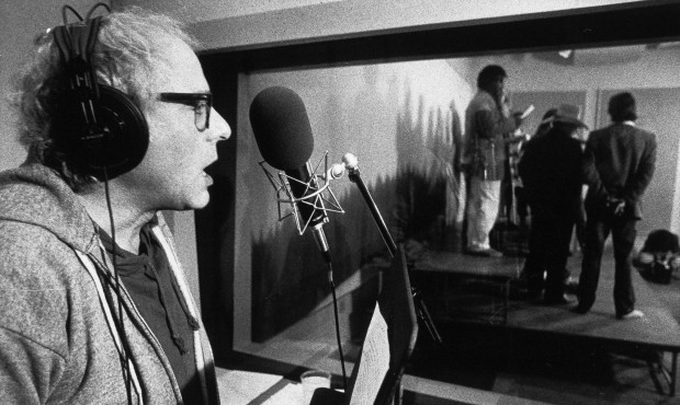 FILE – In this Nov. 20, 1987 file photo, then-Burlington, Vt. Mayor Bernie Sanders sings duri...