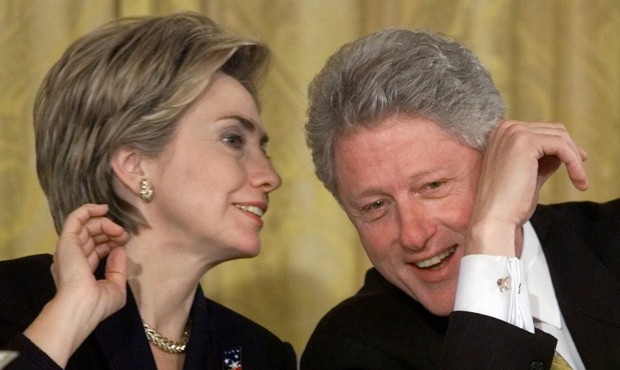 FILE – In this Oct. 22, 1999 file photo, President Bill Clinton and first lady Hillary Rodham...
