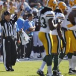Line judge Shannon Eastin signals during an NFL preseason football game between the San Diego Chargers and the Green Bay Packers, Thursday, Aug. 9, 2012, in San Diego. Eastin is a replacement official making her NFL debut in the exhibition game. The regular officials are locked out by the league after their contract expired. (AP Photo/Lenny Ignelzi)
