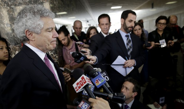 Defense attorney Harvey Fishbein, left, speaks to reporters during a break in the trial of Pedro He...