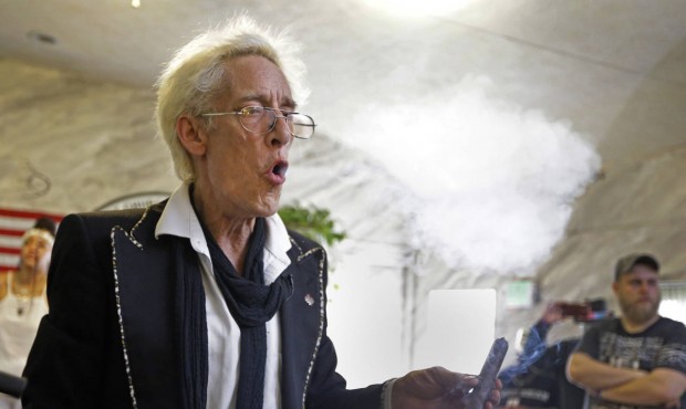 First Church of Cannabis Founder Bill Levin exhales as he smokes a “sacrament substitute&#822...