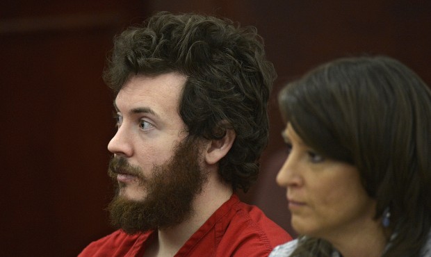 FILE – In this March 12, 2013, file photo, James Holmes, left, and defense attorney Tamara Br...