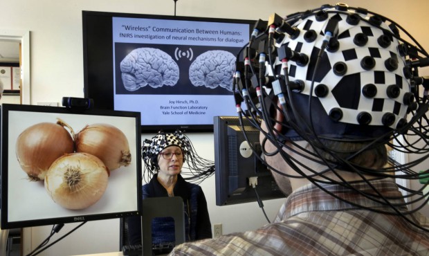 Shaw Bronner, left, and Shaul Yahil, two researchers at the Yale Brain Function Lab, describe image...