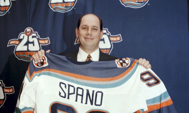 n In this Nov. 26, 1996 photo, John Spano, holds a New York Islanders jersey at the Nassau Coliseum...