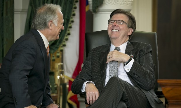 Sen. Kirk Watson, left, shares a lighter moment with Lt. Governor Dan Patrick, right, during a brie...