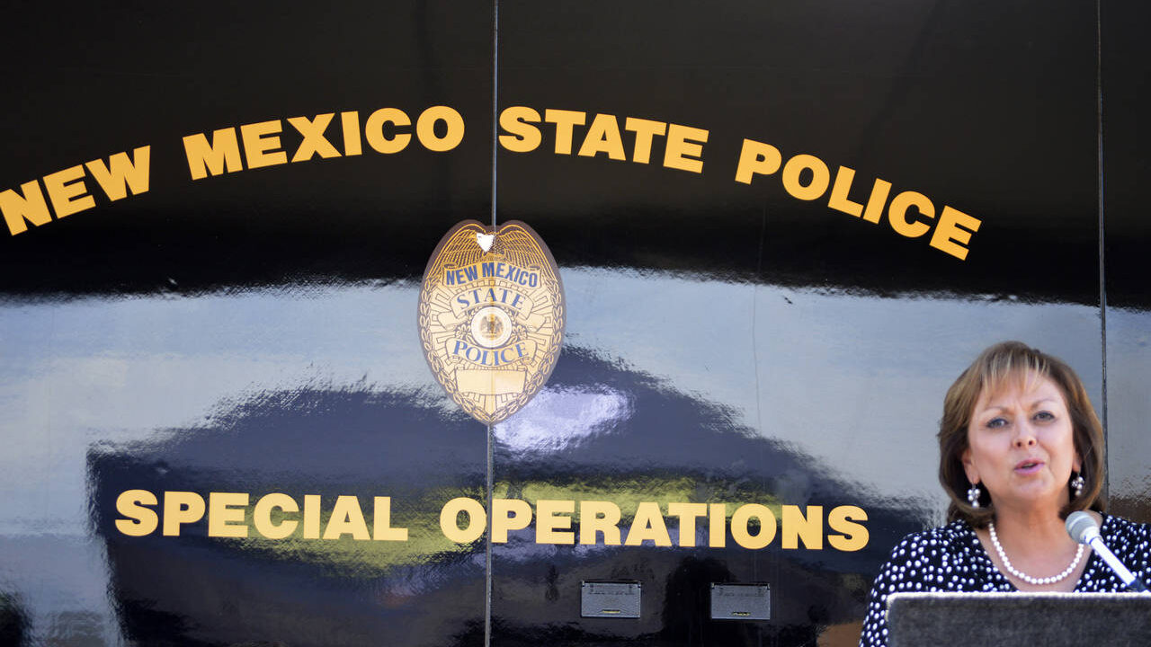 A suspect in the shooting death of a New Mexico state police officer was captured Sunday by law enf...
