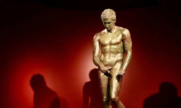 In this Monday, July 27, 2015 photo, a sculpture titled “Athlete, The Croatian Apoxyomenos, G...