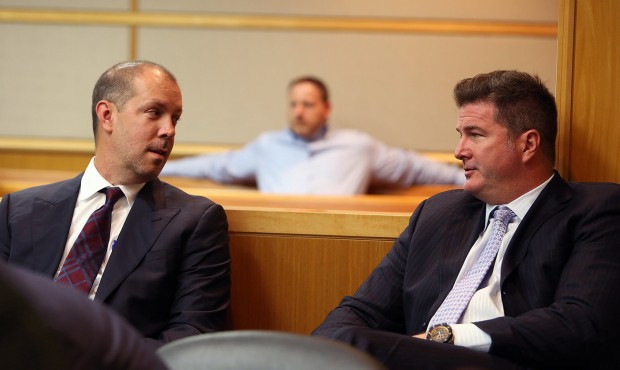 In a Wednesday, May 13, 2015 photo, attorneys Adam Filthaut and Robert Adams, right, talk in court ...