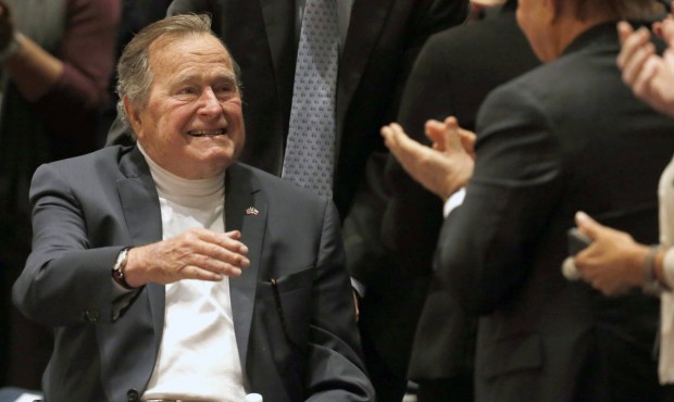 FILE – In this Nov. 11, 2014, file photo, former President George H.W. Bush acknowledges the ...
