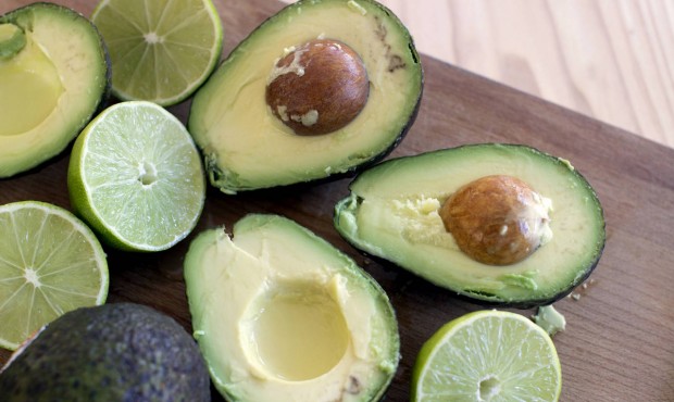 n FILE – This Dec. 15, 2014 photo shows avocados and limes, key ingredients for guacamole in ...