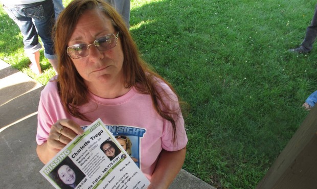In this June 24, 2015, photo, Yvonne Boggs holds a flier seeking information on her daughter, Charl...