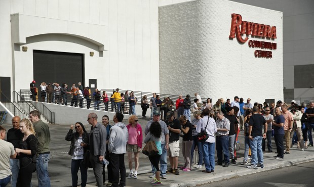 People wait in line to enter a liquidation sale at the closed Riviera Hotel and Casino, Thursday, M...