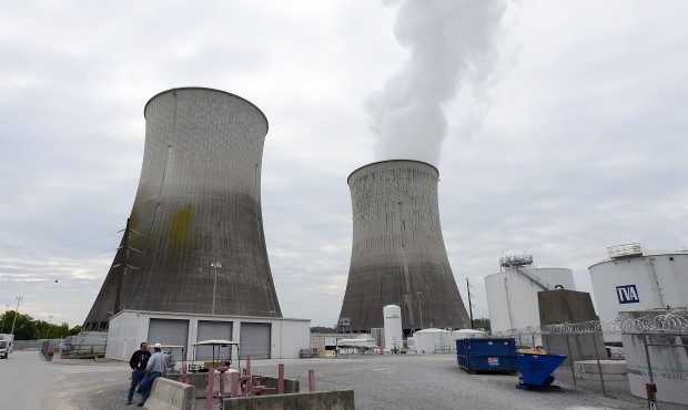 In this April 29, 2015 photo, cooling towers for Unit 1, right, and Unit 2, left, are shown at the ...