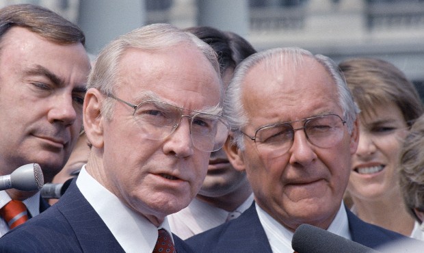 FILE – In this Aug. 5, 1987 file photo, then-House Speaker Jim Wright of Texas, left, and the...