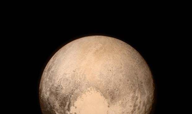 This July 13, 2015 image provided by NASA shows Pluto, seen from the New Horizons spacecraft. The U...
