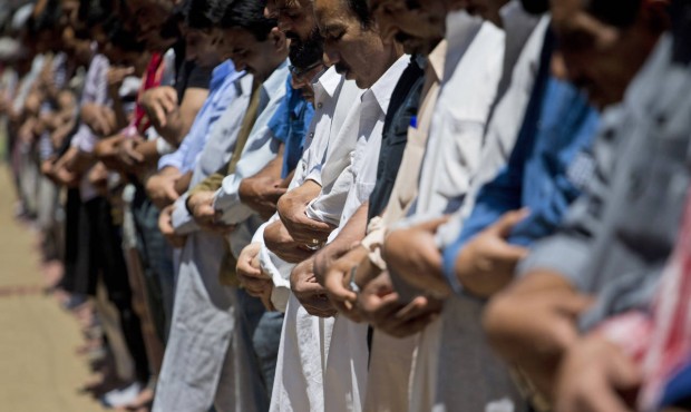 n Muslim men offer Friday prayers during the holy month of Ramadan in Srinagar, Indian controlled K...
