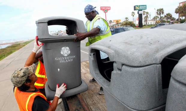 Galveston Island Park Board of Trustees crews removed trash barrels from the seawall Monday June 15...