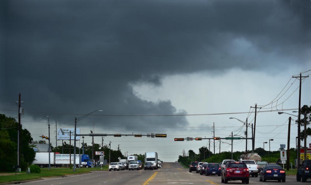 n Ominous low-hanging clouds accompanied a thunderstorm from the outer bands of Tropical Storm Bill...