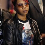               Lesley McSpadden, mother of Michael Brown Jr., listens to the family attorney during a news conference, Thursday, March 5, 2015, in Dellwood, Mo. Neither McSpadden nor Brown's father, Michael Brown Sr., spoke or took questions. The Justice Department on Wednesday cleared former Ferguson, Mo., police Officer Darren Wilson in the fatal shooting of Michael Jr., but also issued a scathing report calling for sweeping changes in city law enforcement practices it called discriminatory and unconstitutional. (AP Photo/Charles Rex Arbogast)
            