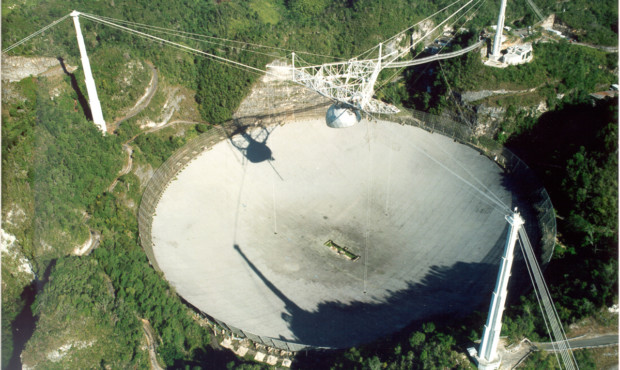 The Arecibo radio telescope in Puerto Rico is the world’s largest single antenna, with a million-...