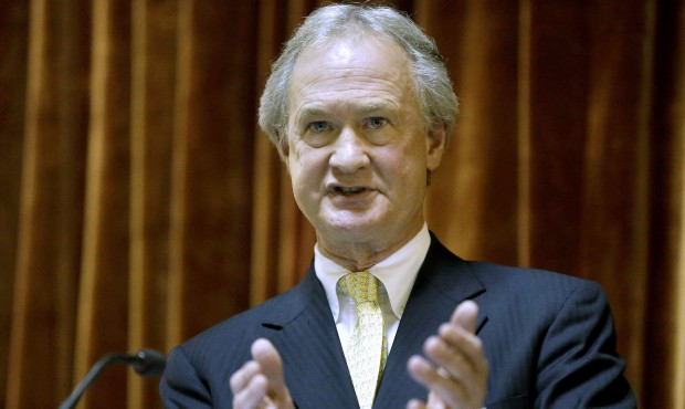 FILE – In this Jan. 15, 2014 file photo, then-Rhode Island Gov. Lincoln Chafee delivers his S...