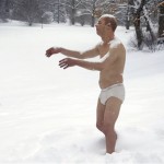 A statue of a man sleepwalking in his underpants is surrounded by snow on the campus of Wellesley College, in Wellesley, Mass., Wednesday, Feb. 5, 2014. The sculpture entitled "Sleepwalker" is part of an exhibit by sculptor Tony Matelli at the college's Davis Museum. (AP Photo/Steven Senne)