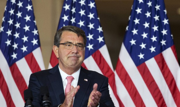 Defense Secretary Ash Carter, leads applause to thank the military service members who served in Vi...