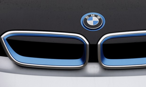 FILE- In this file photo dated Tuesday, Jan. 20, 2015, the logo of German car manufacturer BMW is p...