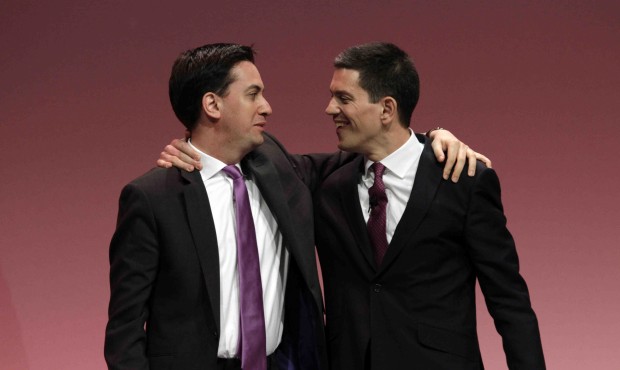 FILE – In this Monday, Sept. 27, 2010, file photo, Ed Miliband, left, the then newly-elected ...