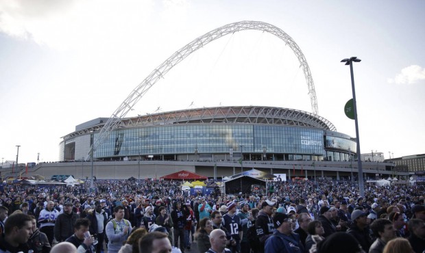 FILE – In this Nov. 9, 2014 file photo, spectators gather outside Wembley Stadium for the NFL...